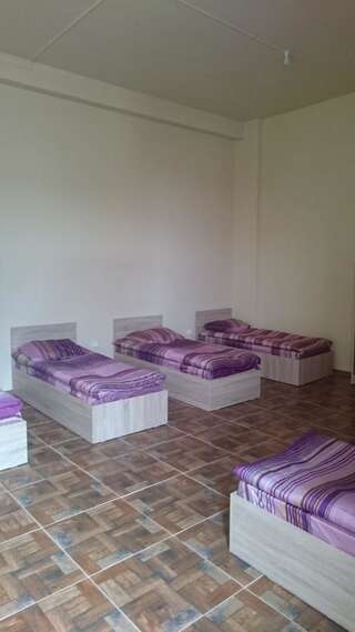 Хостелы Hostel Mandaria Кутаиси Односпальная кровать в общем номере для мужчин и женщин-5